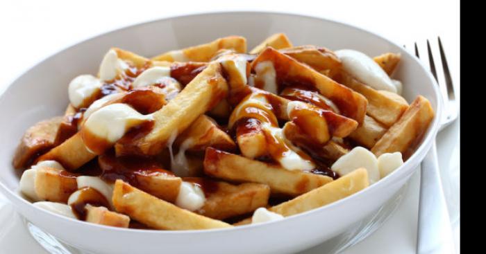 Inscription de la poutine au guide alimentaire Canadien.