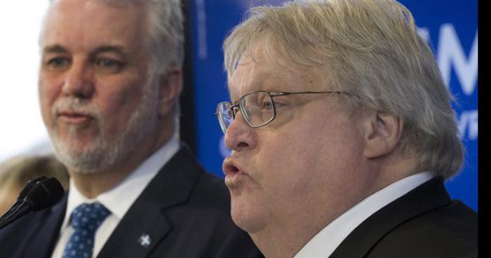 Couillard et Barrette pris en flagrant délit de tendresse.